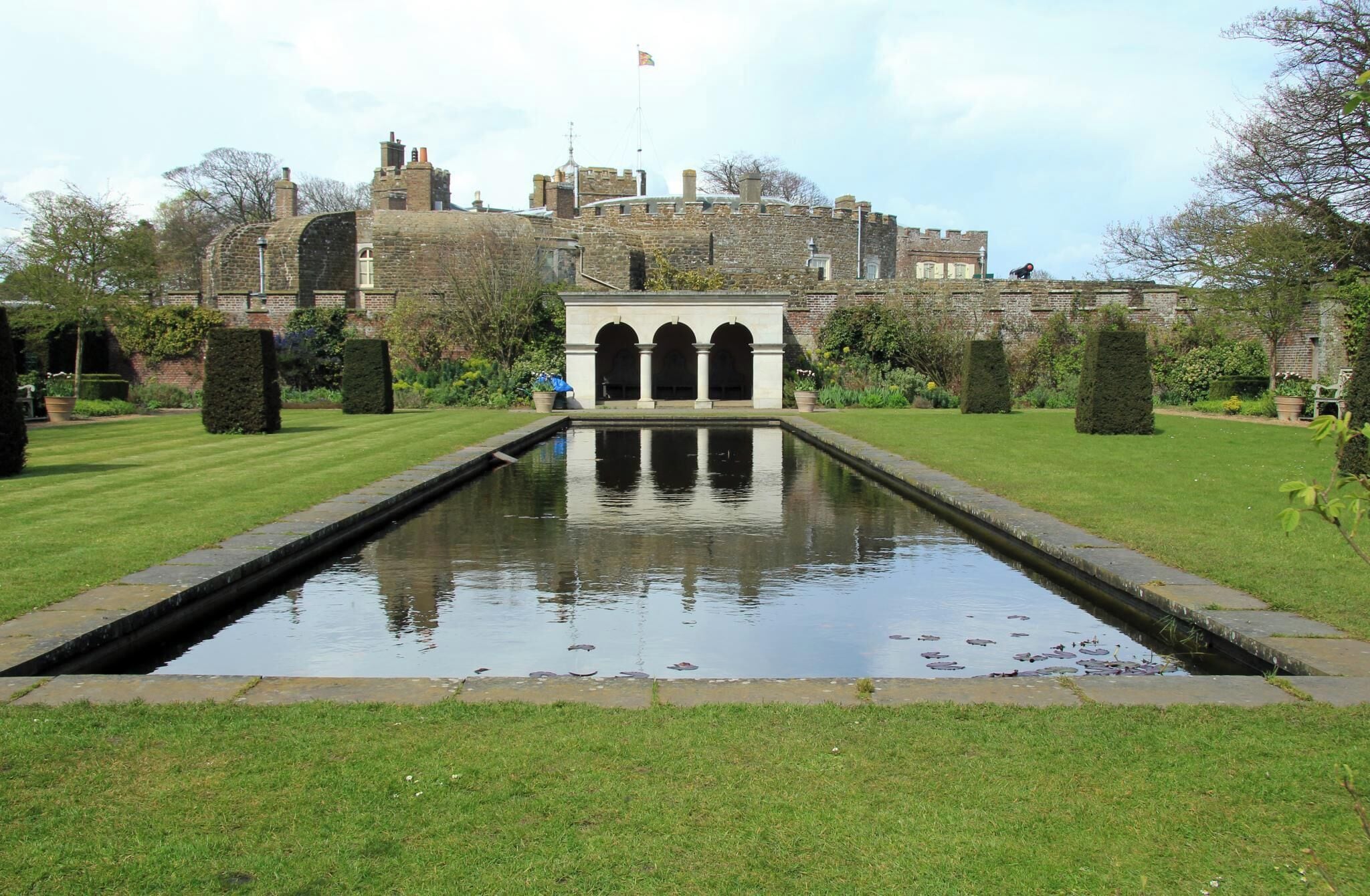 Built during the reign of King Henry VIII, Walmer Castle is one of the most fascinating visitor attractions in the South East. Originally designed as part of a chain of coastal artillery defences it evolved into the official residence of the Lord Warden of the Cinque Ports. The Duke of Wellington held the post for 23 years and enjoyed his time spent at the castle and in recent years Her Majesty Queen Elizabeth the Queen Mother made regular visits to the castle. The armchair in which Wellington died and an original pair of 'Wellington boots' along with some of the rooms used by the Queen Mother are among the highlights. And with the magnificent gardens, a woodland walk and some excellent bird spotting there's something for everyone to enjoy. There is also a pleasant cycle path along the beach front to nearby Deal Castle.