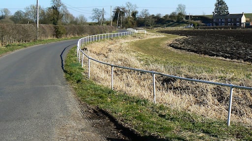 The road to Chirton from Patney The properties in the background are probably in Chirton as the parish boundary between Patney and Chirton lies between them and the viewpoint.