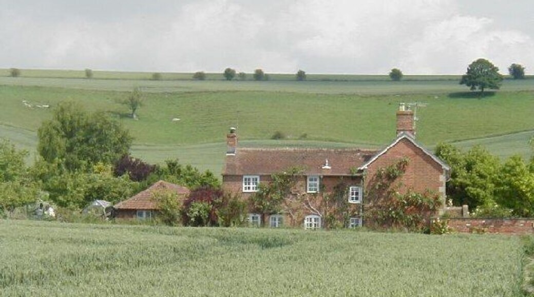 Clays Farm, Easterton. The chalk hills of Salisbury Plain rise up behind Clays Farm