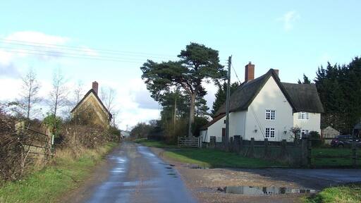 Pond Farm Looking east along minor road with Pond Farm on the right near to Redgrave, Suffolk.