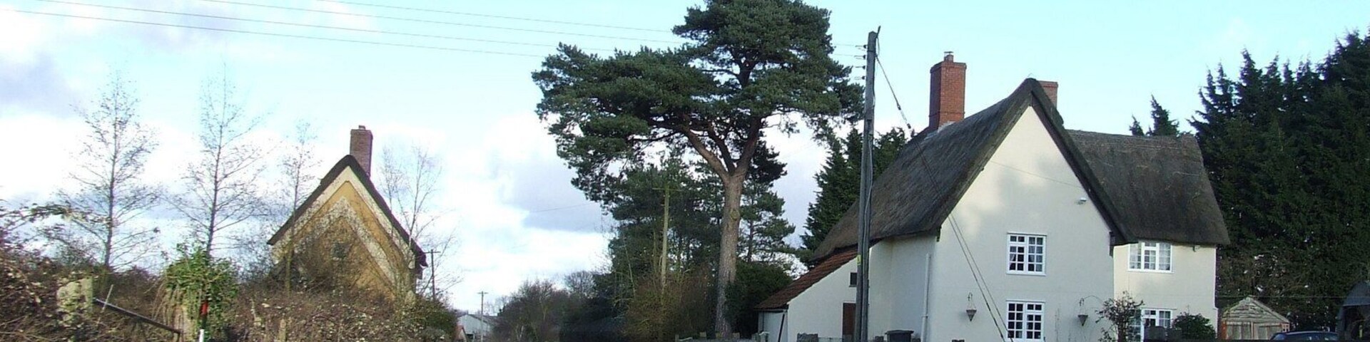 Pond Farm Looking east along minor road with Pond Farm on the right near to Redgrave, Suffolk.