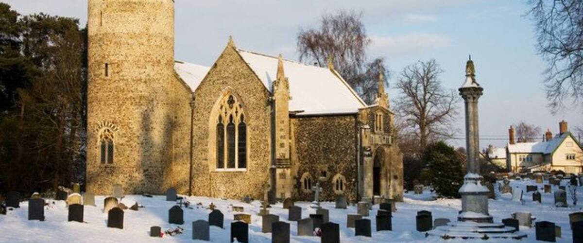St Mary's parish church, Rickinghall Inferior, Suffolk, seen from the southwest in snow