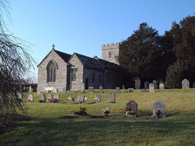 Dewlish Parish Church. Viewed from the north east across the graveyard.