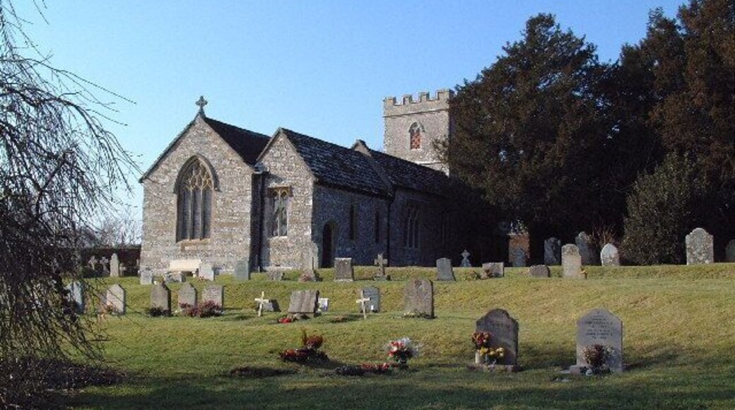 Dewlish Parish Church. Viewed from the north east across the graveyard.