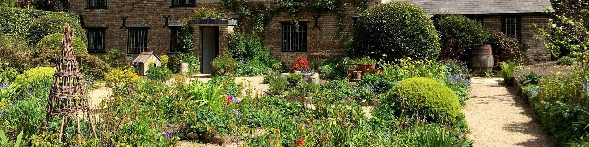 Hardy's cottage on a beautiful spring day. Situated on the edge of Thornecombe Wood which has many trails and a Roman road to nearby Puddletown.