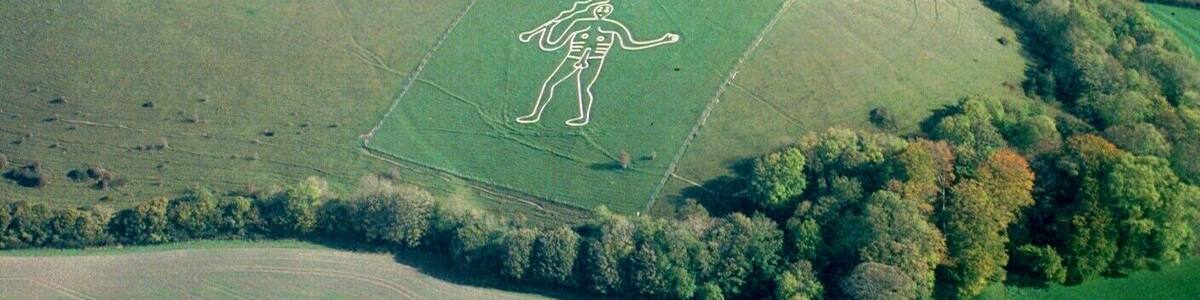 An aerial photograph of the Cerne Abbas Giant taken from a Cessna 150 aircraft using a Nikon F70, AF Nikkor 35-80mm on Fujichrome Velvia stock.