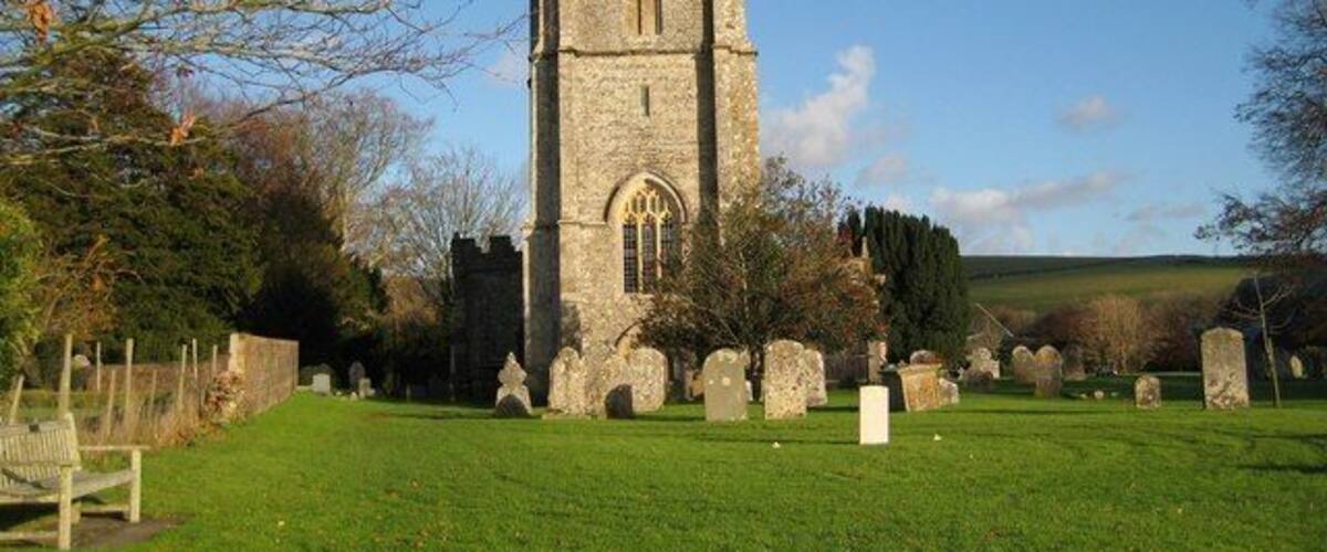 The churchyard - Sydling St Nicholas Looking across the spacious churchyard towards the Church of St Nicholas. Judging by the map the west side of the tower is within this gridsquare!