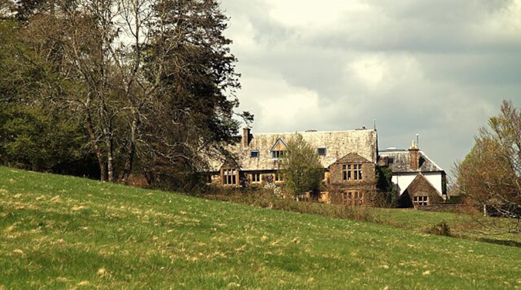 Lewcombe Manor House, East Chelborough A distant shot of Lewcombe manor house from the public footpath. Dating from the late C18, the house is grade II listed.