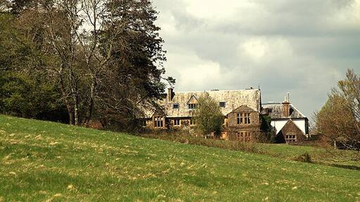 Lewcombe Manor House, East Chelborough A distant shot of Lewcombe manor house from the public footpath. Dating from the late C18, the house is grade II listed.
