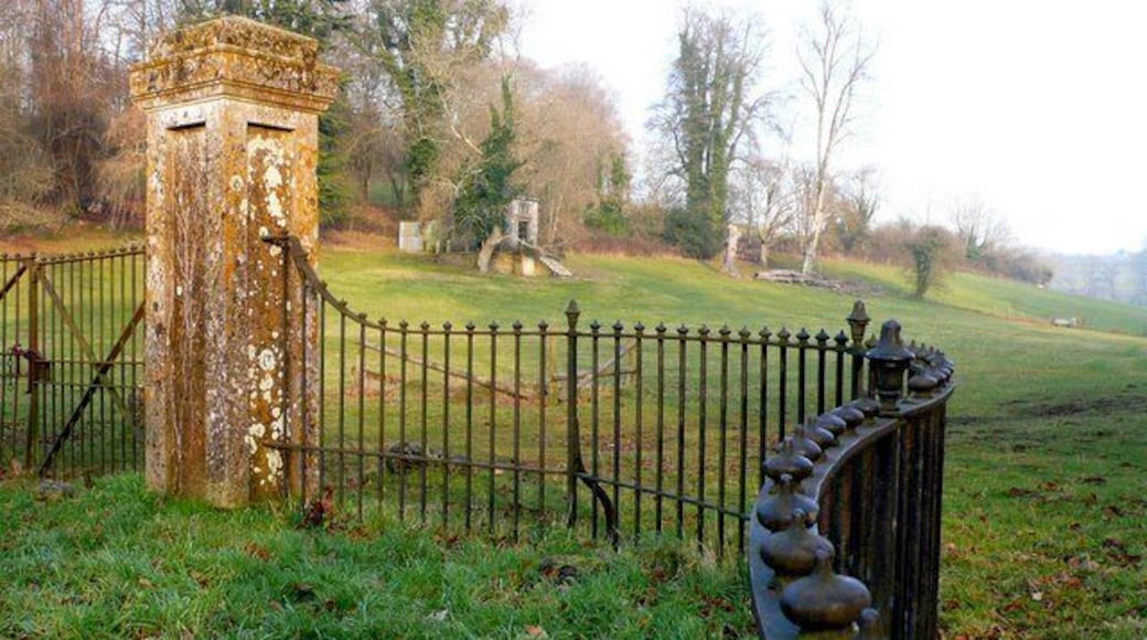 Park Entrance, Piddletrenthide. This is the main gateway to the parkland associated with the manor house in the village. The house is on the west side of the road the parkland on the east. There are several follies in the park such as the one visible.