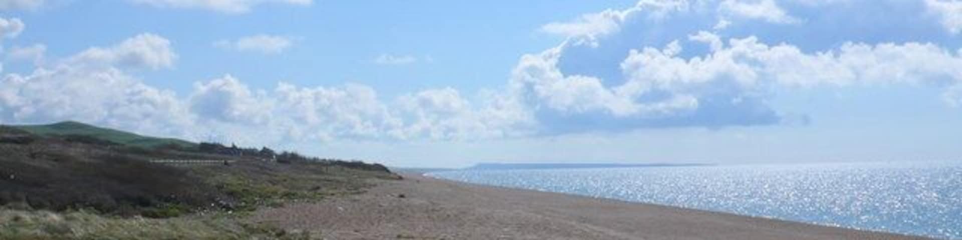 Chesil Beach at West Bexington Looking S-E along the beach with Portland in the background