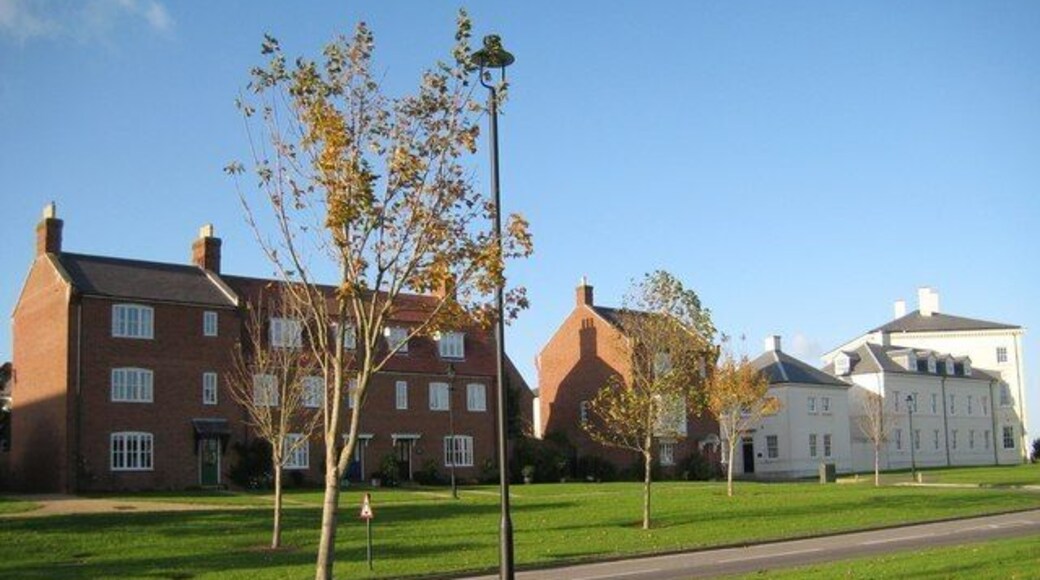 Middle Farm Way - Poundbury Having left the Briport Road further west as a detour, Middle Farm Way now leads back to a roundabout onto the same road but nearer Dorchester. There are many new houses being built along its way.