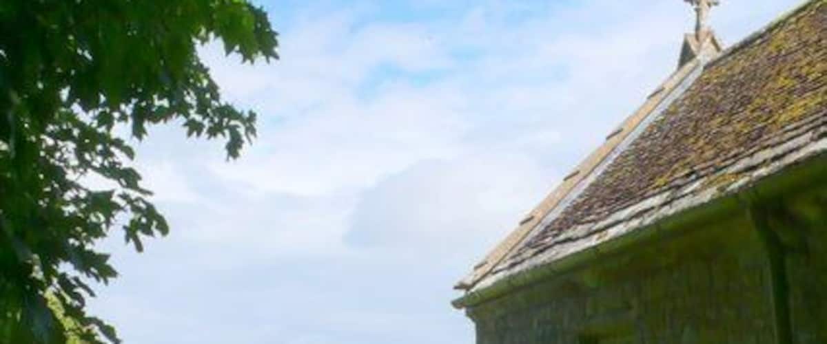 Whitcombe Church, near to Whitcombe, Dorset, Great Britain. View looking east along the north side of the church