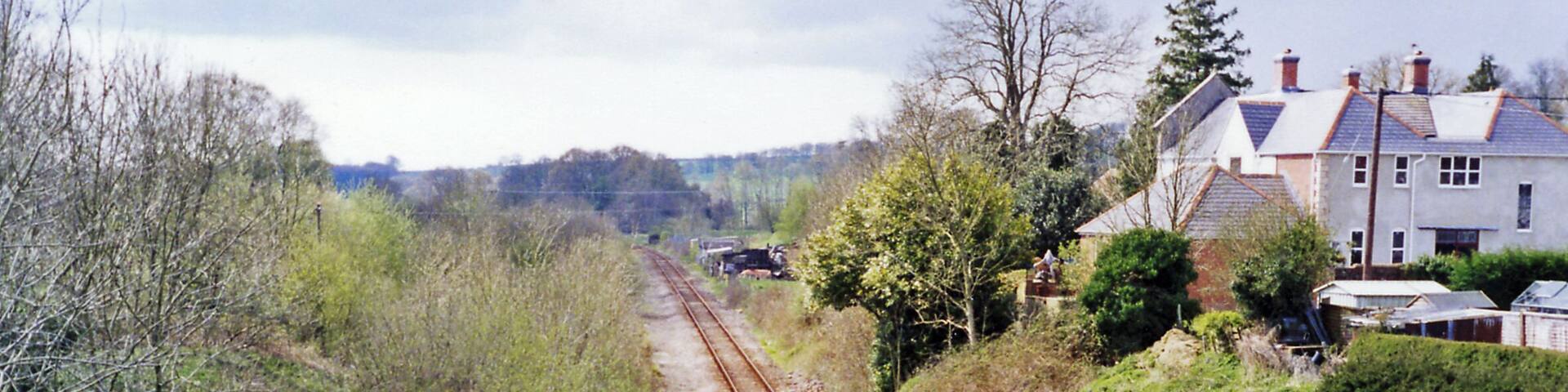 Site of Evershot station, 1995. View southward, towards Dorchester and Weymouth: ex-GWR (London, Bristol etc.) - Westbury - Yeovil - Dorchester - Weymouth main line. The station was closed 3/10/66 and the line singled about that time. This was the summit of a stiff climb in both directions.