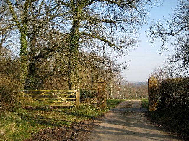Gateway and drive to Lewcombe At the end of the tree-lined drive is the manor of Lewcombe with its tiny church, the parish church of East Chelborough.