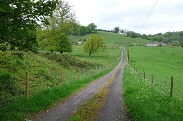 Road to Woolcombe Farm The farm lies at the end of its own road just off the minor road between Holywell and Redford.