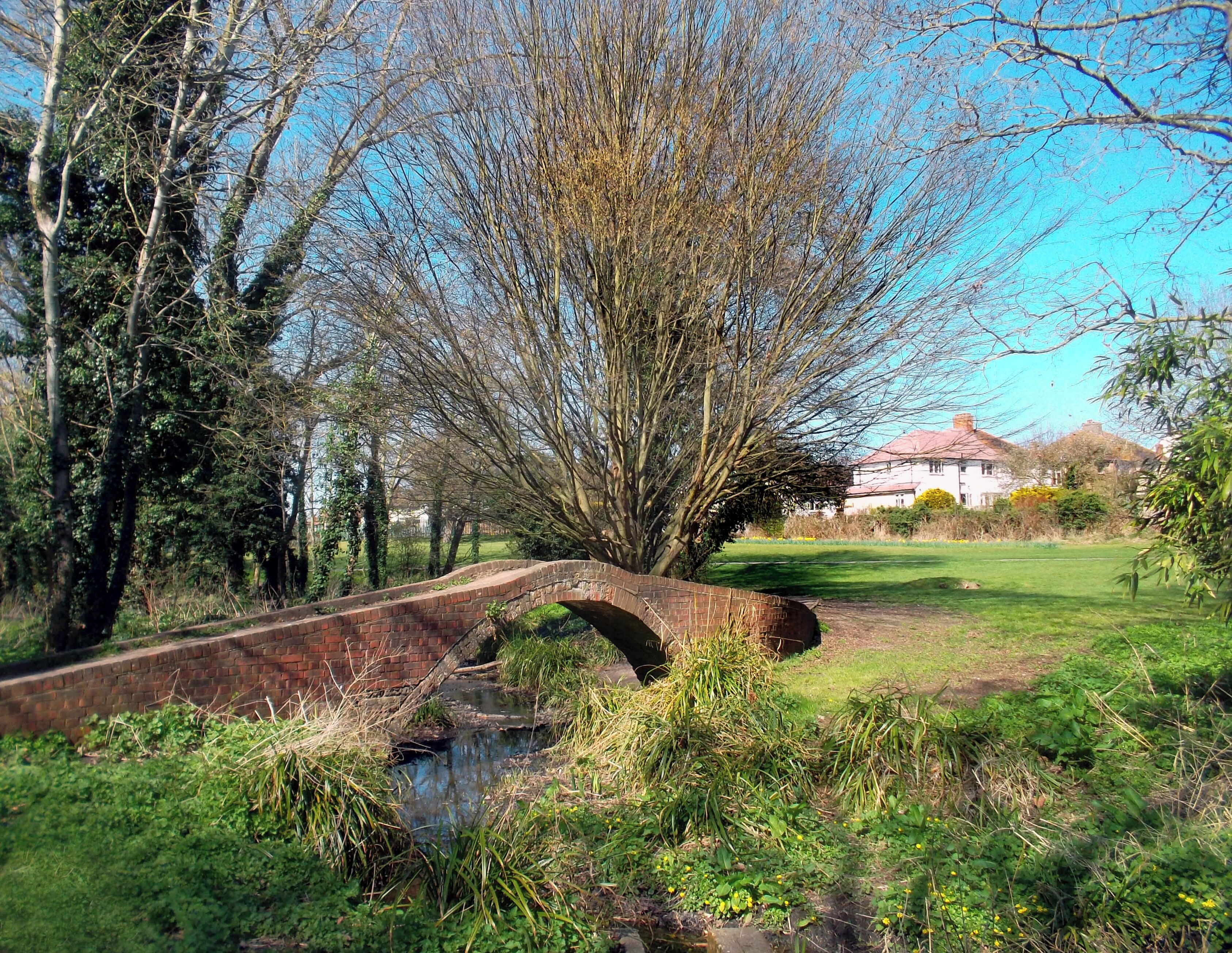 Packhorse bridge over the Hogsmill River in Ewell Court Park, West Ewell, Surrey