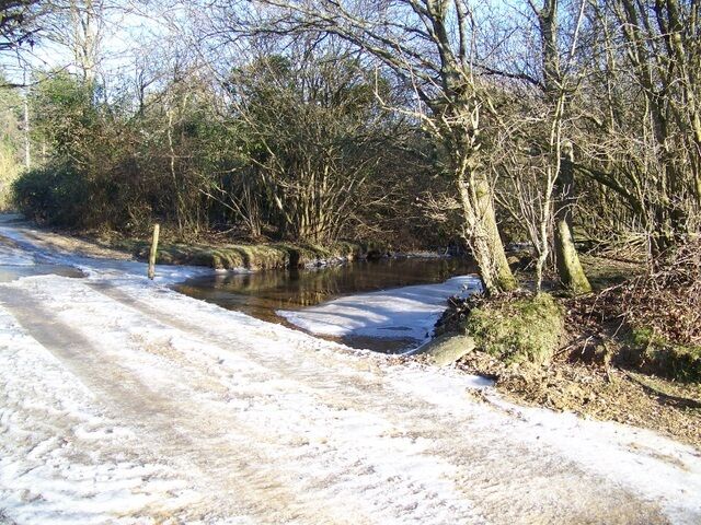 Bridge over Huckles Brook Parts of the brook are frozen although the centre of the brook is still running. The temperature at the time of taking the image was -7.5 degrees.