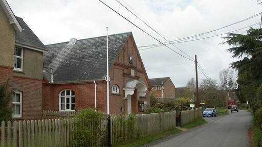 Whitsbury Village Hall On the main street, with an inscription dated 1906, and a plaque to the racehorse Desert Orchid, stabled nearby.