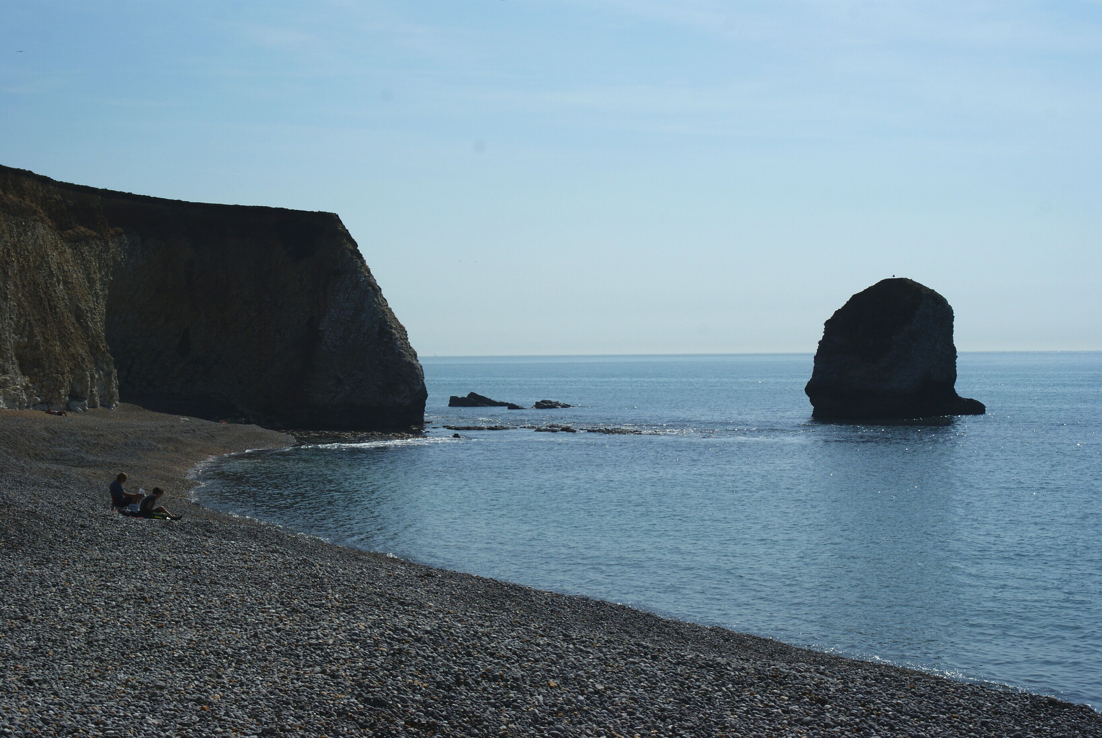 View Towards Stag Rock, Isle of Wight Looking across Freshwater bay, towards Stag Rock, and the base of Arched Rock (collapsed in 1992). Timed at 12.00, which indicates that afternoon is the time to visit, for direct sunlight on the western face of the sea stack.
