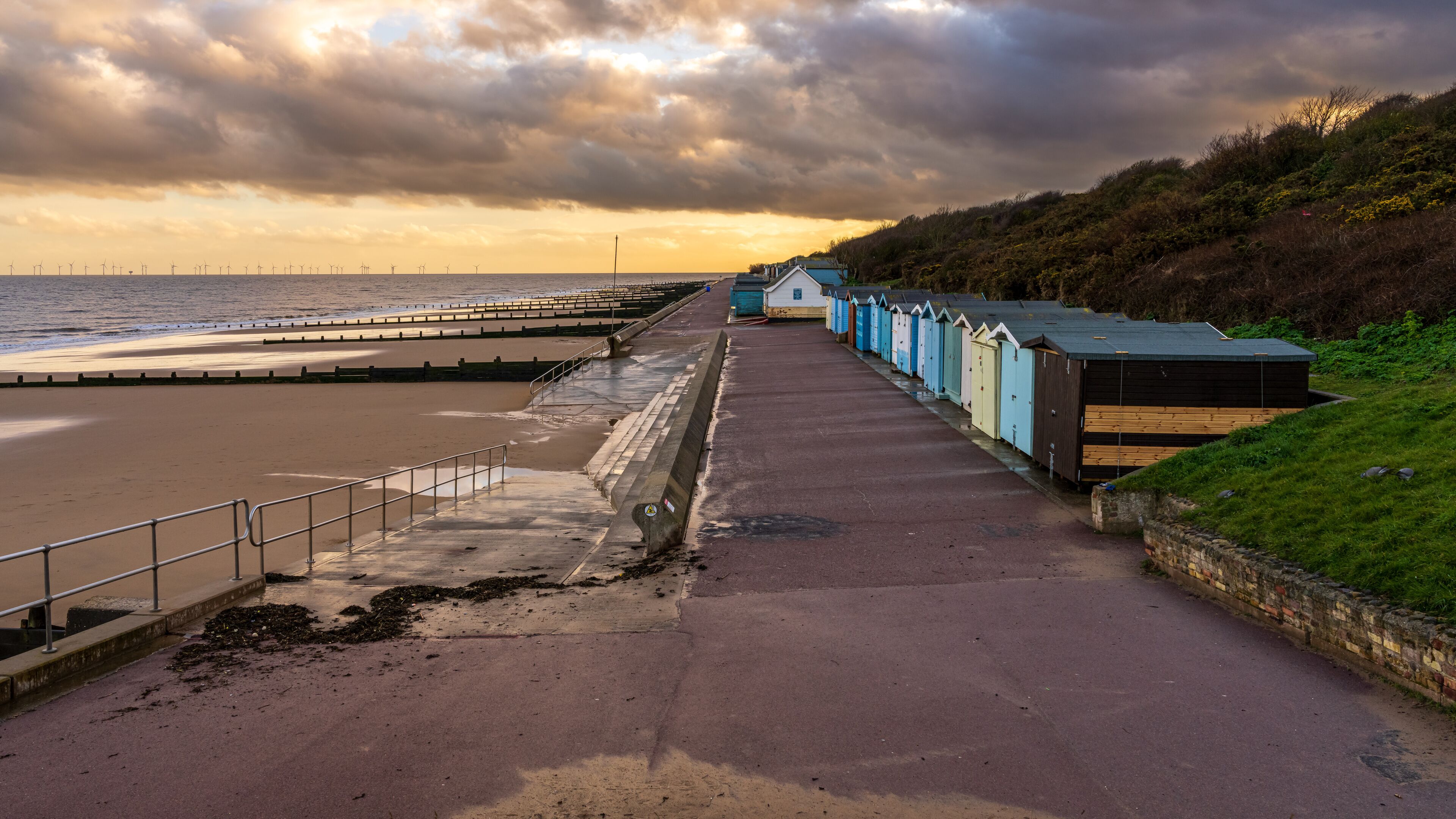 Beach huts on the North Sea coast at Frinton-on-Sea, Essex, England