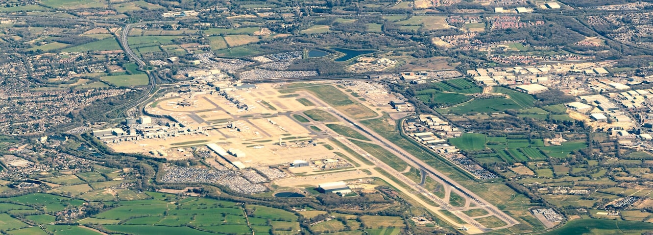 Aerial view of Gatwick Airport and the surrounding towns, villages and countryside of West Sussex in England