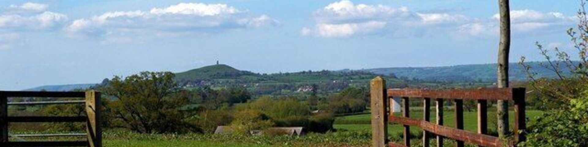 Broad Park Farm Gate. This is the entrance to Broad Park Farm. Between Barton St David and Butleigh Glastonbury Tor Can be seen in the background