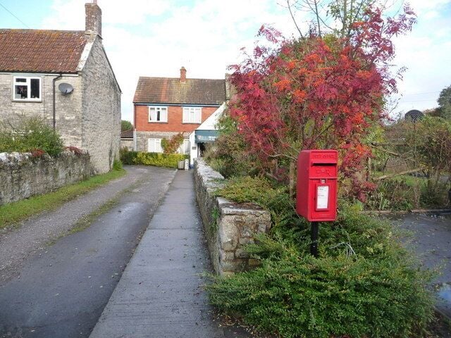Meare: postbox № BA6 162 This postbox stands outside 1553944, which can be seen in the distance. It is emptied finally at 4:30pm on weekdays and at 10:15am on Saturdays.