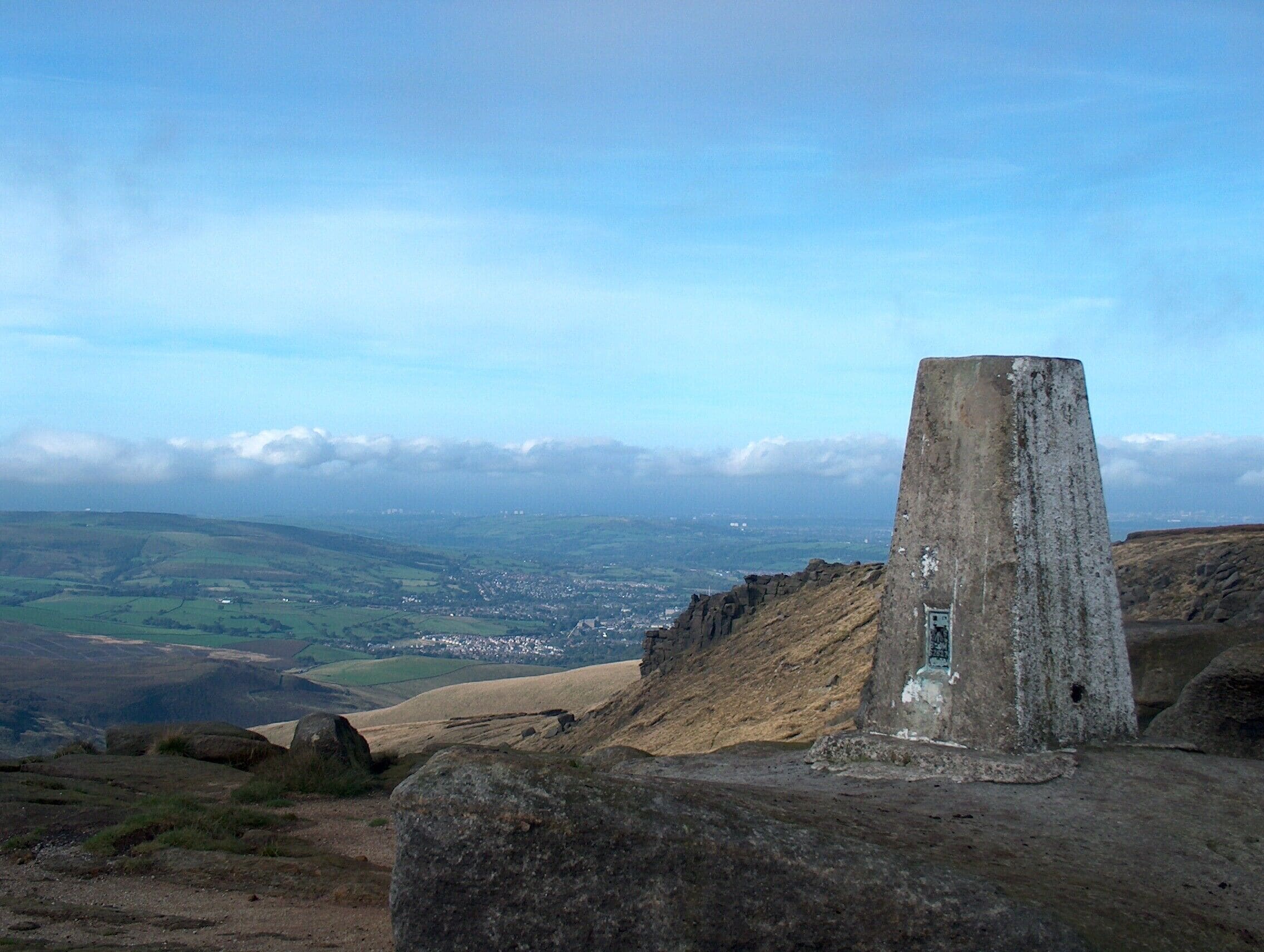 Higher Shelf Stones trig point Glossop is down below.