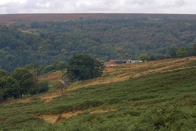 Hill Farm Viewed from across Allan Tofts. The smaller cottage on the left is Lins Farm.
