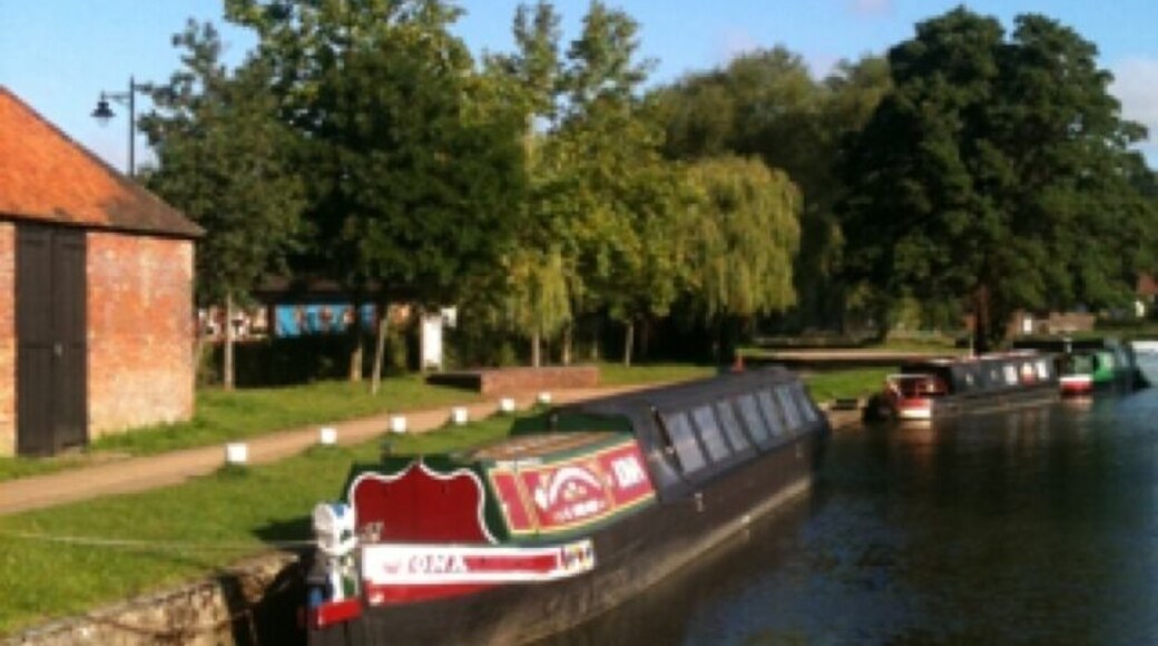 View of the canal at Farncombe, Godalming, Surrey. Iona is a horse-drawn canal boat and you can book a trip along the canal.