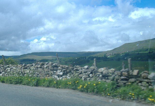 Litherskew Mid Pennine weather scuds in as Litherskew recedes into shadow in this view just before Catriggs farm