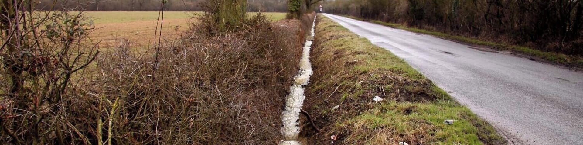 Drainage ditch at the side of the road