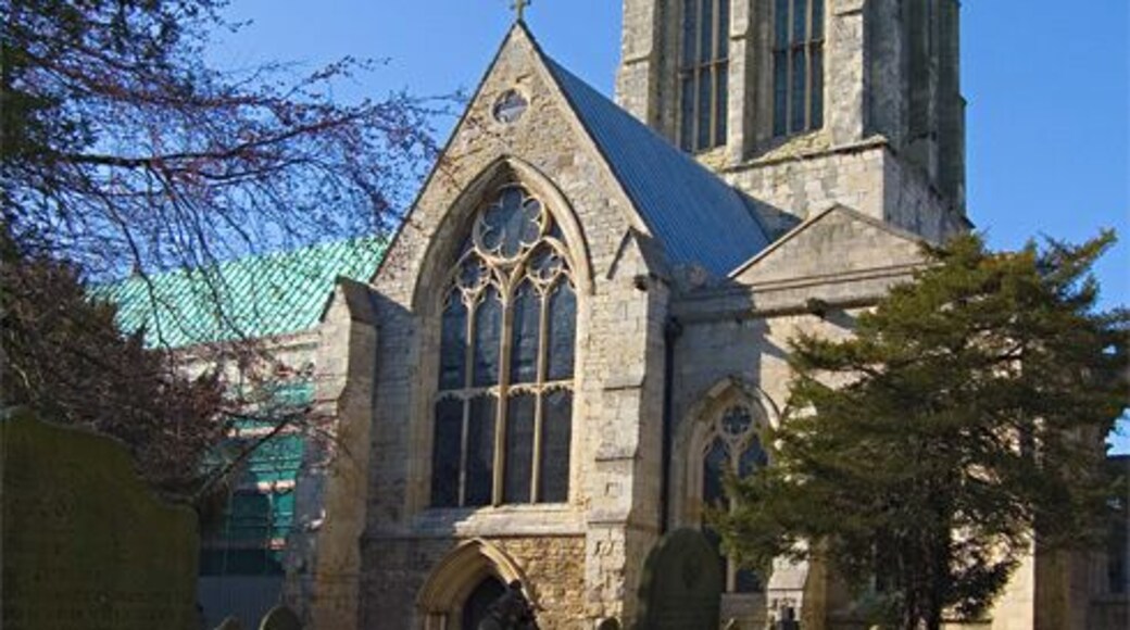 Howden Minster tower, Howden, East Riding of Yorkshire, England Seen from the churchyard to the south. Scaffolding can be seen to the left of the picture for the restoration work on the south side of the church.