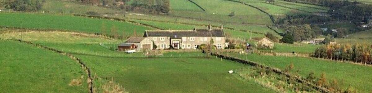 Lower Laithe, near Newsholme. Grade II listed house, seventeenth century with nineteenth century alterations. Seen looking northwards from Slack Lane.