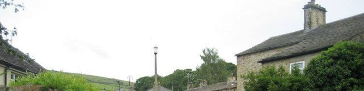 Shady Lane, Cononley The unmetalled Shady Lane approaching Woodside Lane in Cononley.