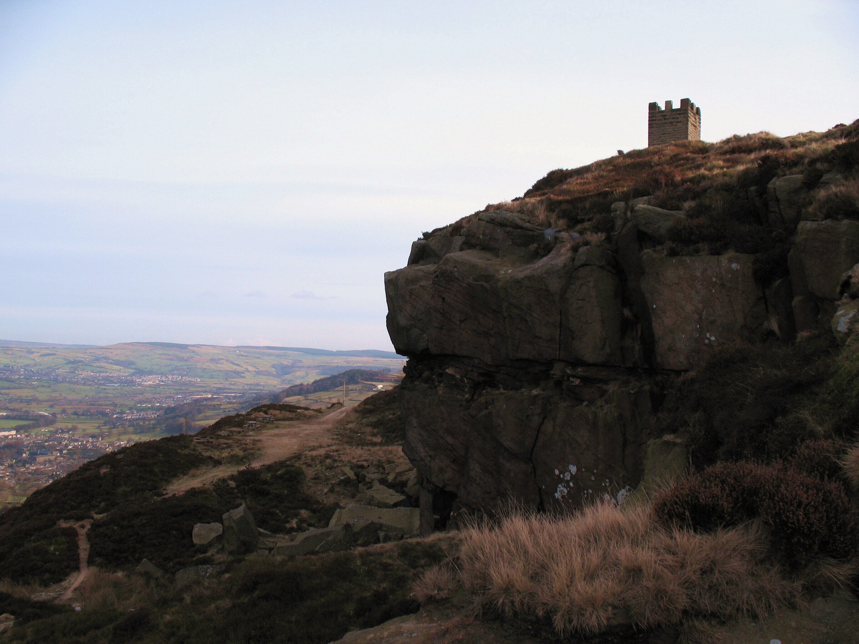 Old Quarry and Lund's Tower Old sandstone quarry at the eastern end of Earl Crag. Lund's Tower stands on the crest of the hill.