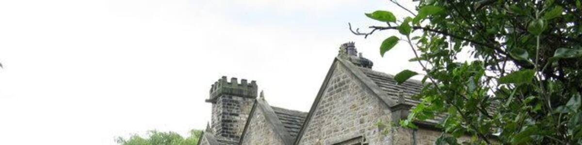 Glusburn: Old Hall Farm Very well shielded from the main road by thick trees, this superb building can only be photographed, with difficulty, from the path along the side.