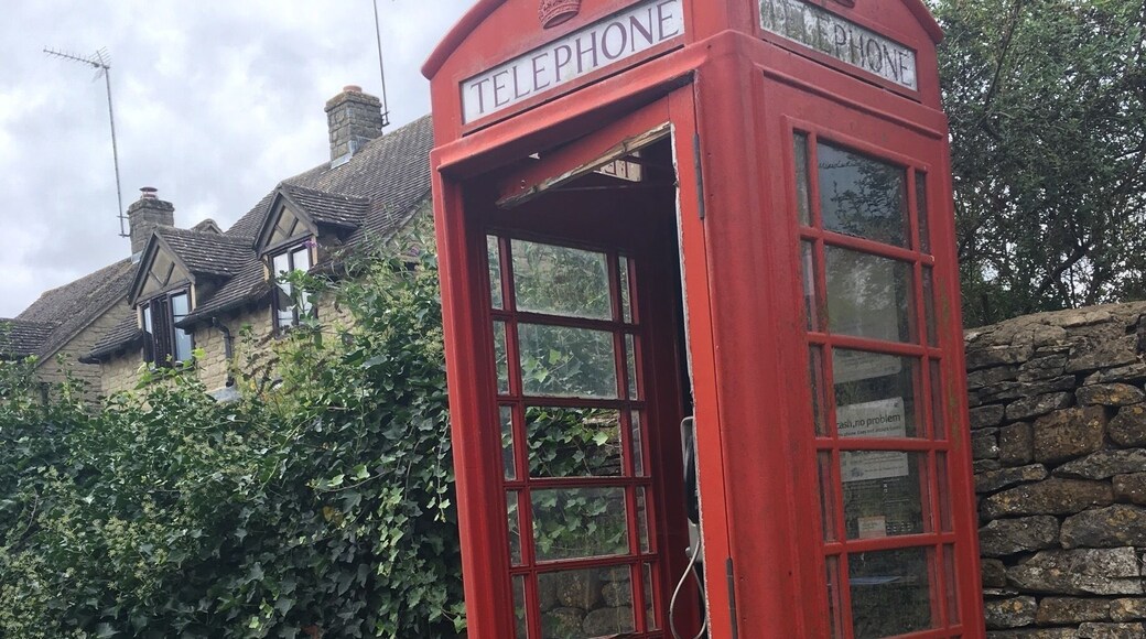 Abandoned telephone booth along the pathways in the middle of the Cotswolds