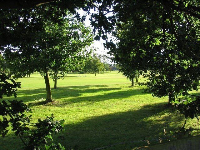 Golf Course. This image was taken from Peacock Lane looking South across the golf course. The shot was taken from SJ708845.