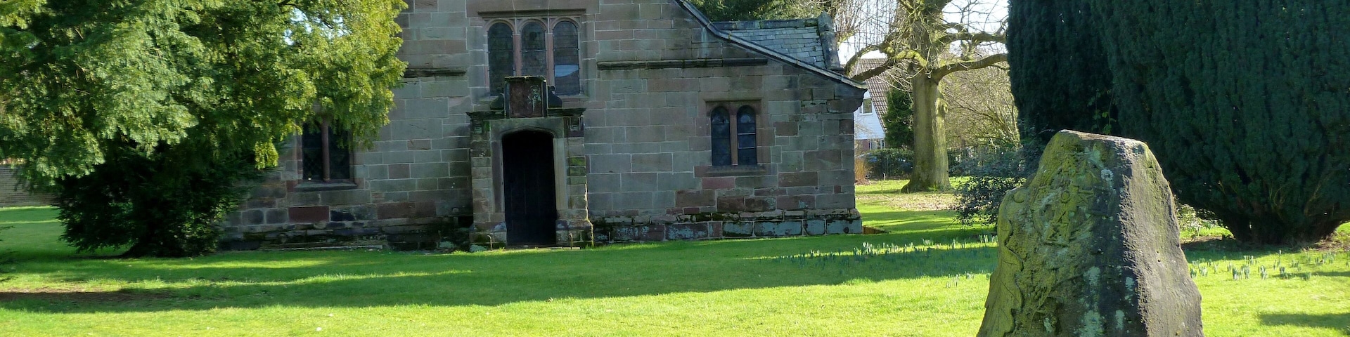 Chapel of the Blessed Virgin Mary, Pheasant Walk, High Legh, Cheshire, seen from the west. In the foreground is the High Legh Millennium Stone, installed in 2000.
