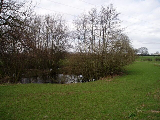 Pond and fields near Winterbottom near High Legh Cheshire countryside with the busy M6 behind the photographer viewing Winterbottom near High Legh