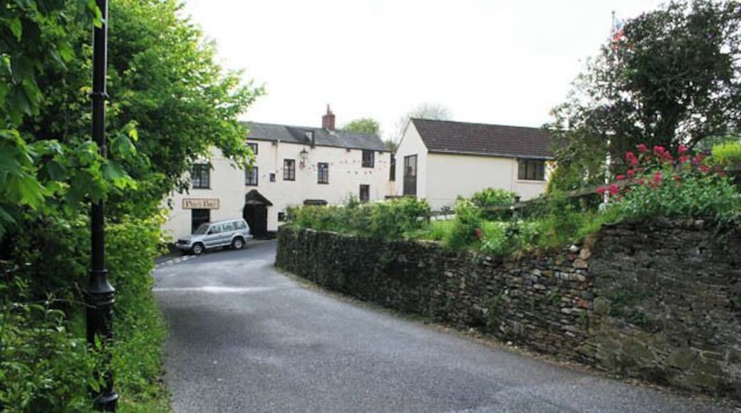 The Punch Bowl Inn, Lanreath The oldest part of the premises dates from the 13th century but the main part of the inn is 15th century. There are thick walls, flagstone floors, beams and medieval panelling. Cornwall is famous for its myths and legends, each town and village laying claim to at least one fantastic story and Lanreath is no exception. Here we have the tale of a wild black cockerel believed to be the angry soul of an old rector of the parish. One night his guest for dinner was the new young curate who had unfortunately fallen in love with the rector's young and beautiful wife. On his way to the cellar to get another bottle of wine the rector fell to his death down the stairs. Did he fall or was he pushed? We'll never know, but the next day a large black cockerel suddenly appeared and began attacking everyone in sight. At last the angry bird flew in through the window of The Punch Bowl Inn and straight into the clome oven. The quick thinking kitchen maid shut him inside and a mason was called to cement it up for ever.