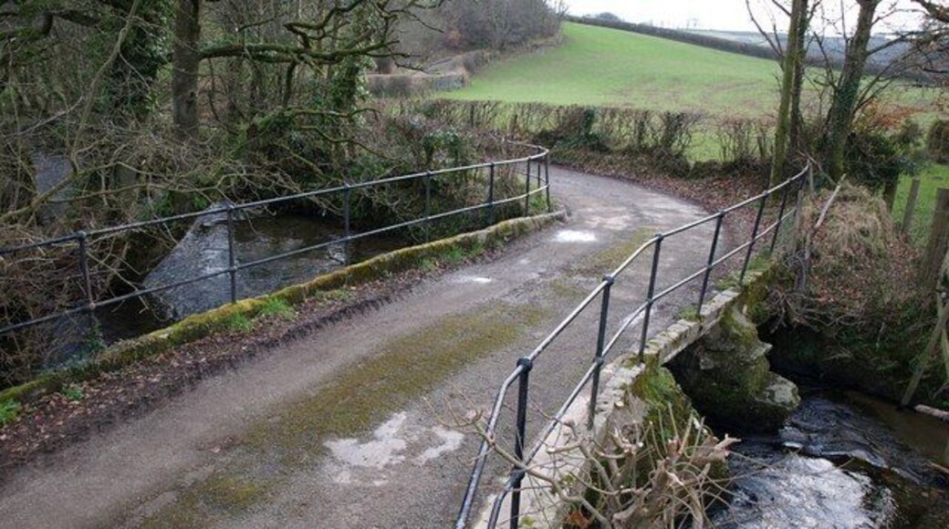 Bridge near Polyphant The lane from Polyphant to Trevell crosses Penpont Water, which is flowing to the left, before climbing the hill in the background.