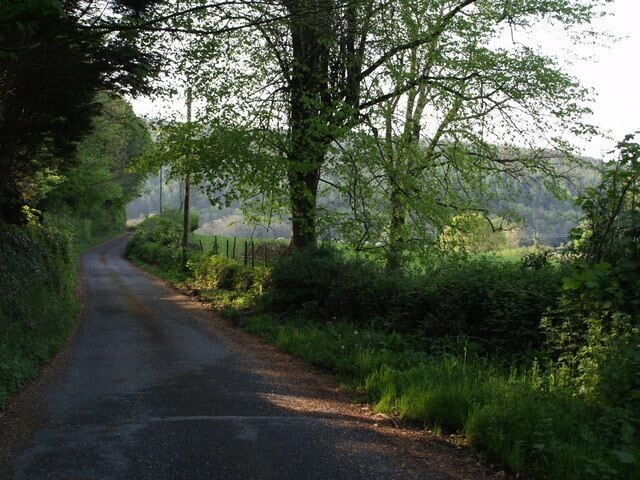 Lane to Lewquarry Farm. This is a no through road leading off 422424, and winding round a hill towards the River Lew.