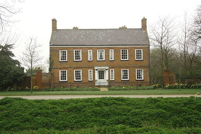 Garnsgate Hall Grade II* listed early 18th century house at Lutton Garnsgate, on a misty Spring morning