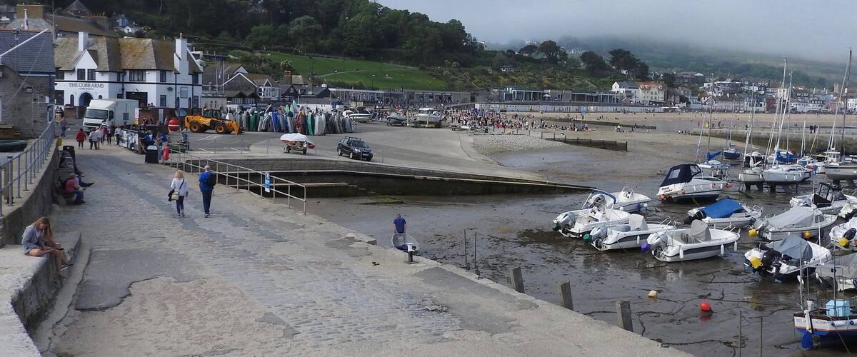 The Cobb an old stone pier forming an extensive harbour and believed to date from the time of Edward I. The origin of the name is unknown, but there are records of an ancient feast called the “Cobb Ale Feast”. With a length of 870 feet the curve of the Cobb forms a fine promenade though its upper surface slopes to the sea at an appreciable angle. Its high wall makes it a double promenade and walkers have a choice of shelter or a glorious blow.
#LikeALocal
