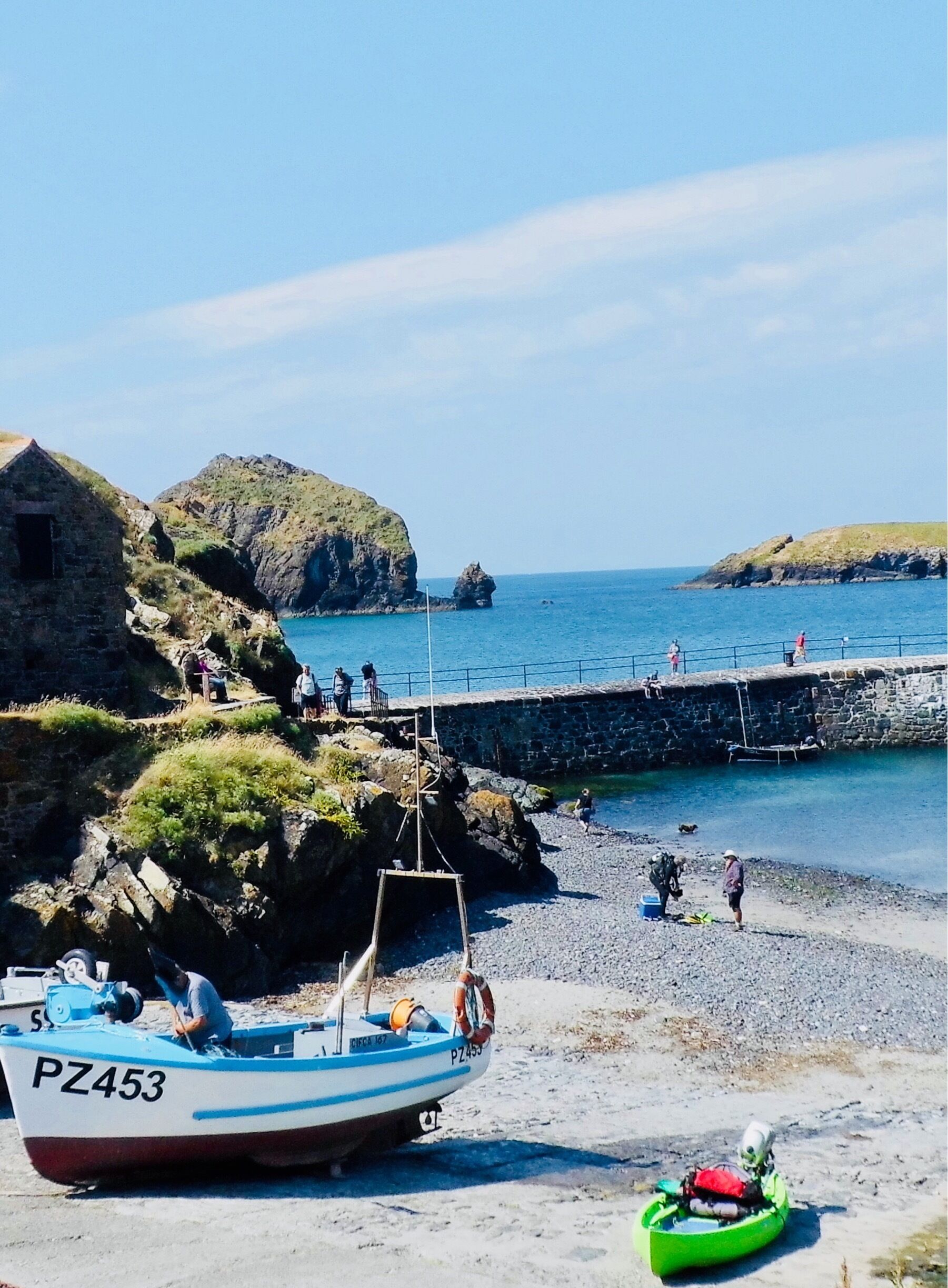 Stunning area of Cornwall , lovely little bay , fisherman bringing in their catch 