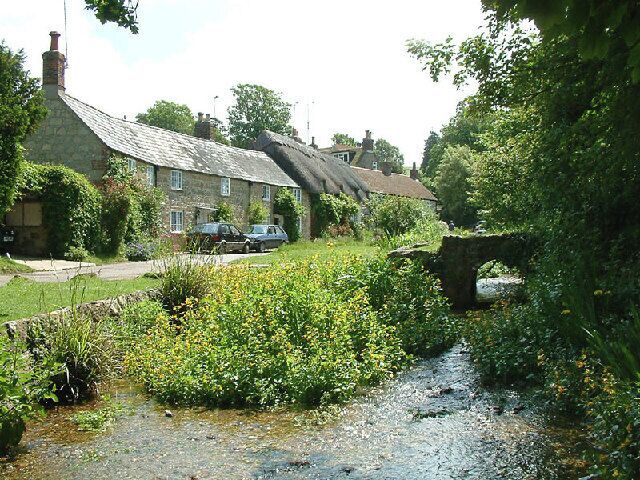 Winkle Street. The chocolate-box image of Winkle Street (also known as Barrington Row) in Calbourne, with the Caul Bourne running in front of the houses, once powering five mills