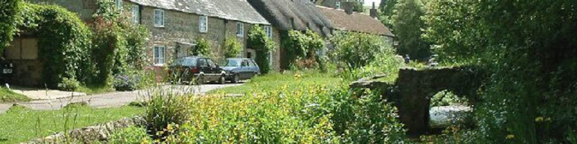 Winkle Street. The chocolate-box image of Winkle Street (also known as Barrington Row) in Calbourne, with the Caul Bourne running in front of the houses, once powering five mills
